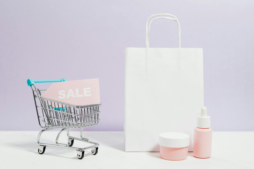 Aesthetic shopping scene with a white bag, cart, and cosmetics on sale.